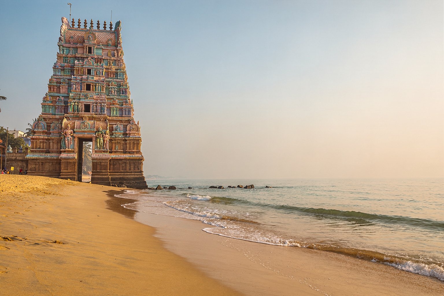 Temple tower beside a beach in southern India (illustrative image)