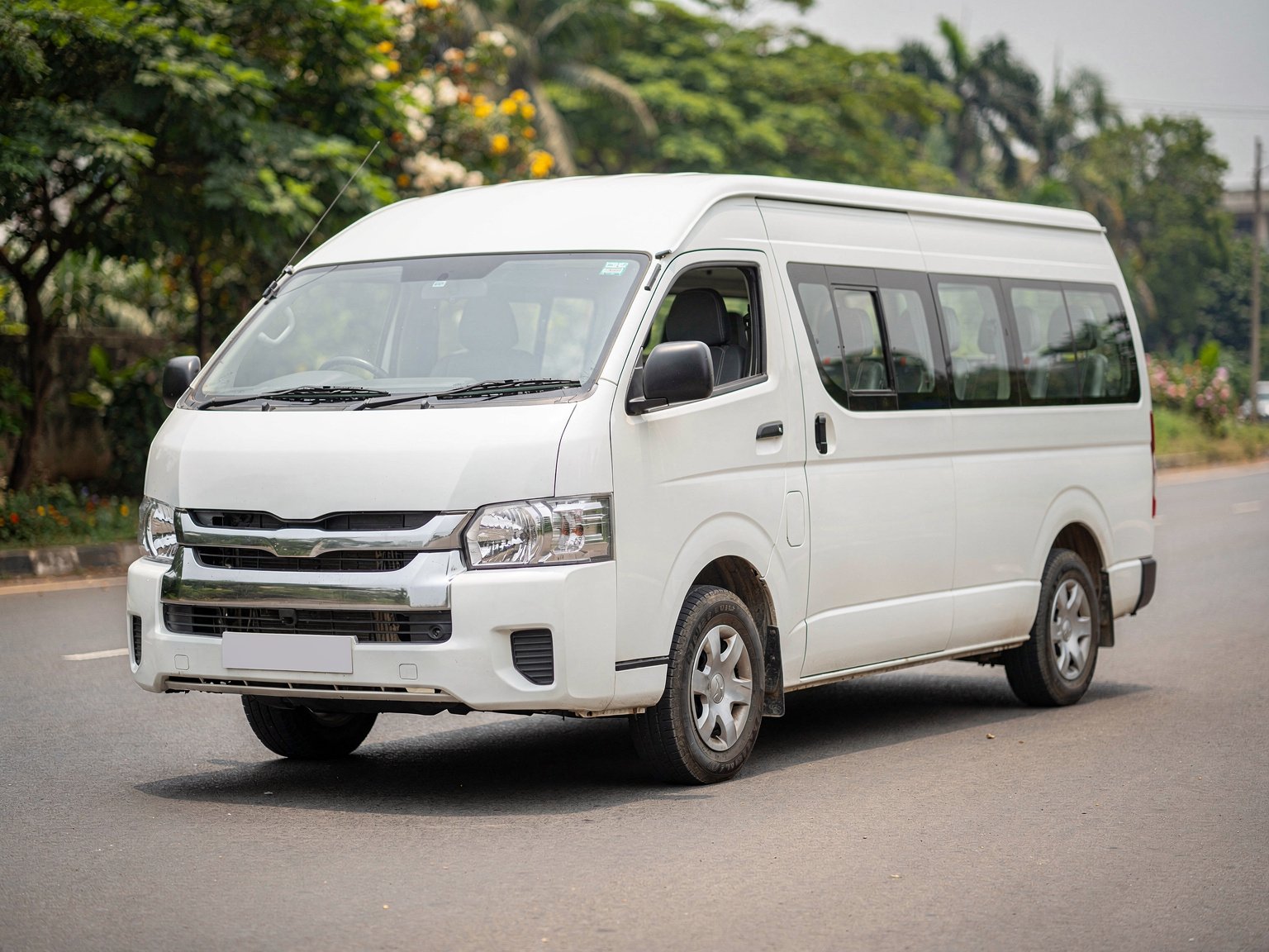 White group travel minibus category, available on request (illustrative image)
